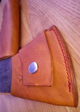 Leather sheath & overstrike