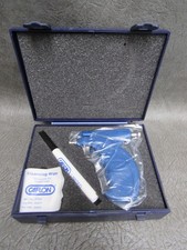 A UNUSED CAFLON EAR PIERCING