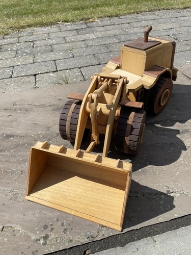 Large wooden articulted digger