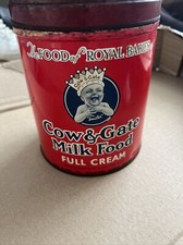 Vintage 1959 Cow & Gate baby milk formula tin, featuring the "Smiler" baby