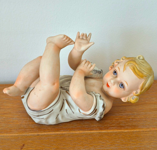 Porcelain baby figurine hand - baby,