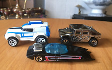 LOT OF THREE "HOT-WHEELS" DIECAST VEHICLES [1:64]
