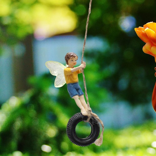 Wing sculpture boy tire - wing,