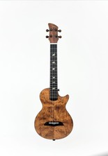 Passive Electric, solid body tenor ukulele. By master luthier Tom Ziegenspeck.