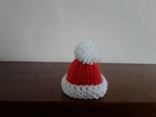 CHRISTMAS SANTA HAT HAND