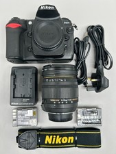 Nikon D200 + Sigma 18-50mm f/2.8 EX + CF Card + Extras + 34K Shutter count