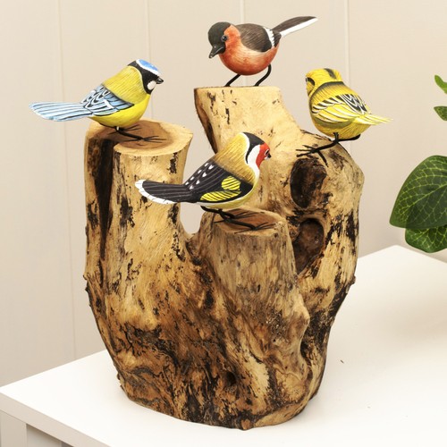 Hand carved birds on - carved,
