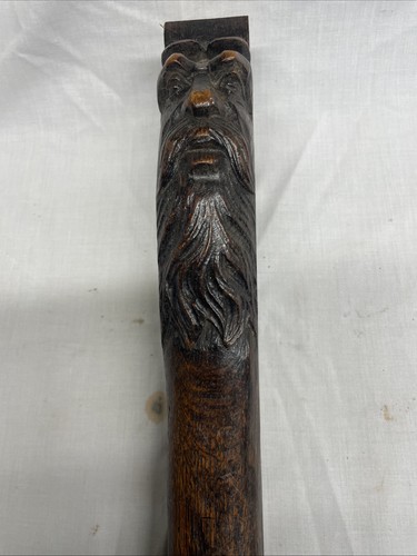 Carved green man - man, panel
