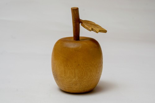 Wood apple ornament with - with, leaf