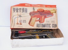 Old tin toy double barrel