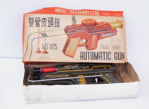 Old tin toy - double, barrel