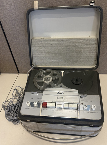 Vintage norelco reel - to,