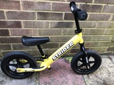 Strider 12 Sport Bike - No Pedal Balance Bicycle for Kids - 1 to 4 Years Yellow