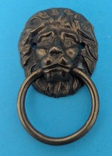 ANTIQUE BRASS LION HEAD CHEST