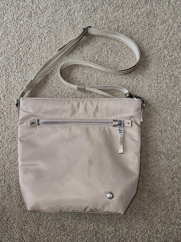 Pacsafe anti theft crossbody - pacsafe,