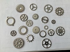 Metal Cogs In Silver Colour