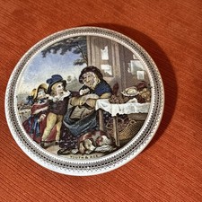 A decorative ceramic pot lid