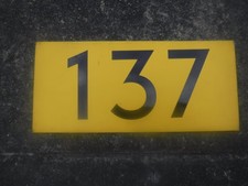 Bus running number plate 137