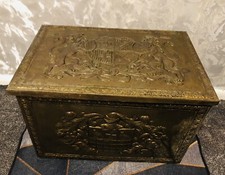 Heraldic embossed brass log - embossed,