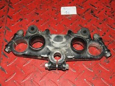 Triple clamp top fork upper