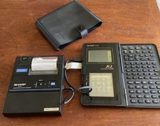 Vintage Sharp IQ 7000 and