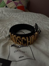 Moschino Belt Women. Black with Gold writing. Size 44. Brand new. Bag and tag.