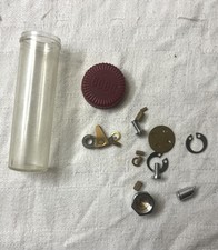 Vintage ABU Ambassador 6000 Spare Parts Tube Containing Some Parts 