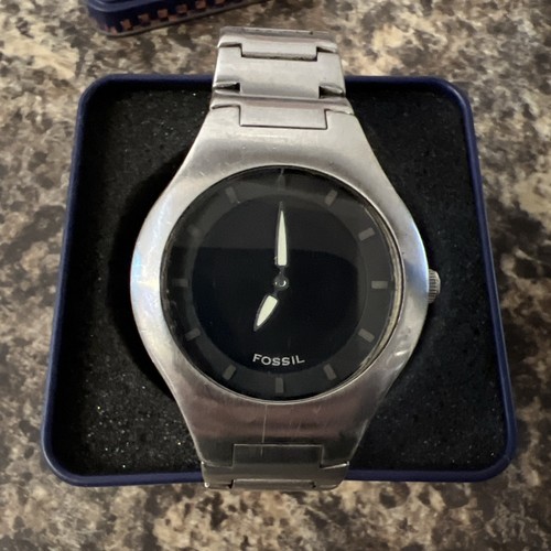 Unusual fossil big tic - fossil, lcd