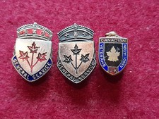 WW2 Canadian Military Service lapel badges, two  individually numbered.