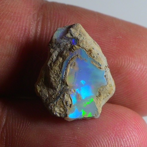 Smooth white opal rough 45 - opal,