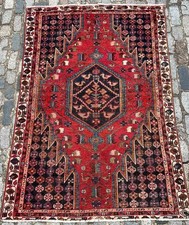 A CHARMIN OLD HANDMADE TRADITIONAL ORIENTAL WOOL ON COTTON RUG (190 x 128 cm)*