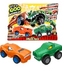 Heroes of Goo Jit Zu Goo Mobiles- Tygor Vs Rock Jaw Stretch em Smash Cars Green