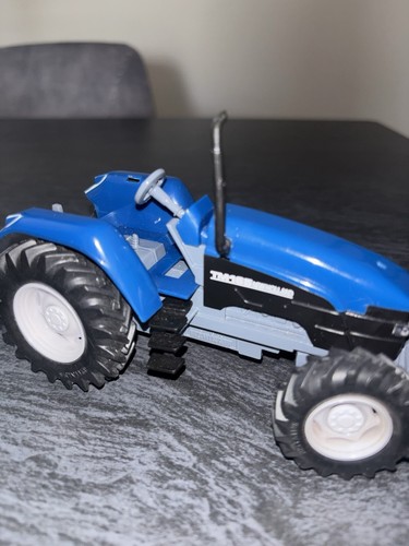 165 new holland tractor - tm,