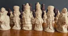 The Alice in wonderland chess set board game pieces stunning and collectible