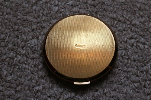Stratton art deco - style, gold