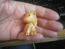 Carved wood , netsuke size , around 4.5cm high , cute horse sitting figure