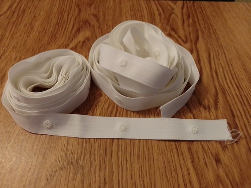 White popper tape - popper, stud