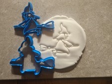 Witch on a broomstick cookie