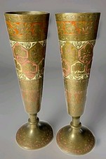 Brass vases with etched
