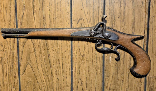 Sexton metal pistol wall