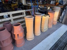 A Collection Of Eight Chimney Pots