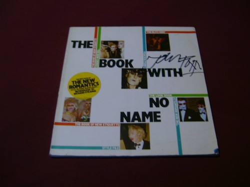 The book with name signed - with, no