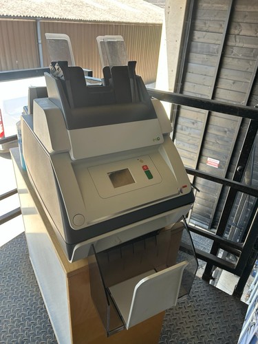 Mailing machine feeder - machine.,