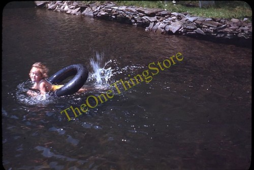Blonde girl swimming raft tube - blonde,