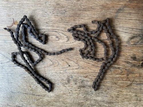 Two dirty bike chains - dirty,