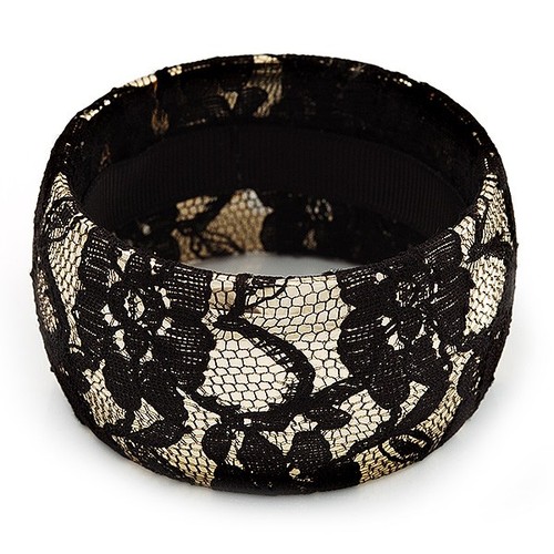Gold tone bangle with black - tone,