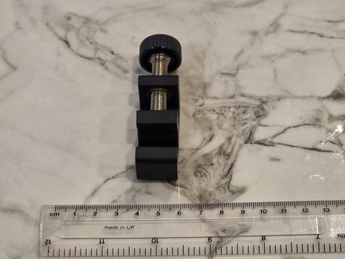 Binocular tripod clamp