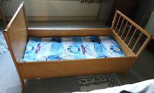 child's bed or cot bed with mattress