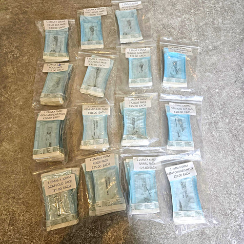 Approx 100 mixed ear piercing - 100,