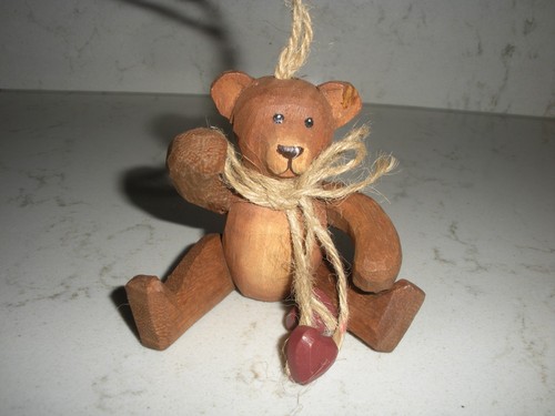 Carved wooden bear ornament - carved,